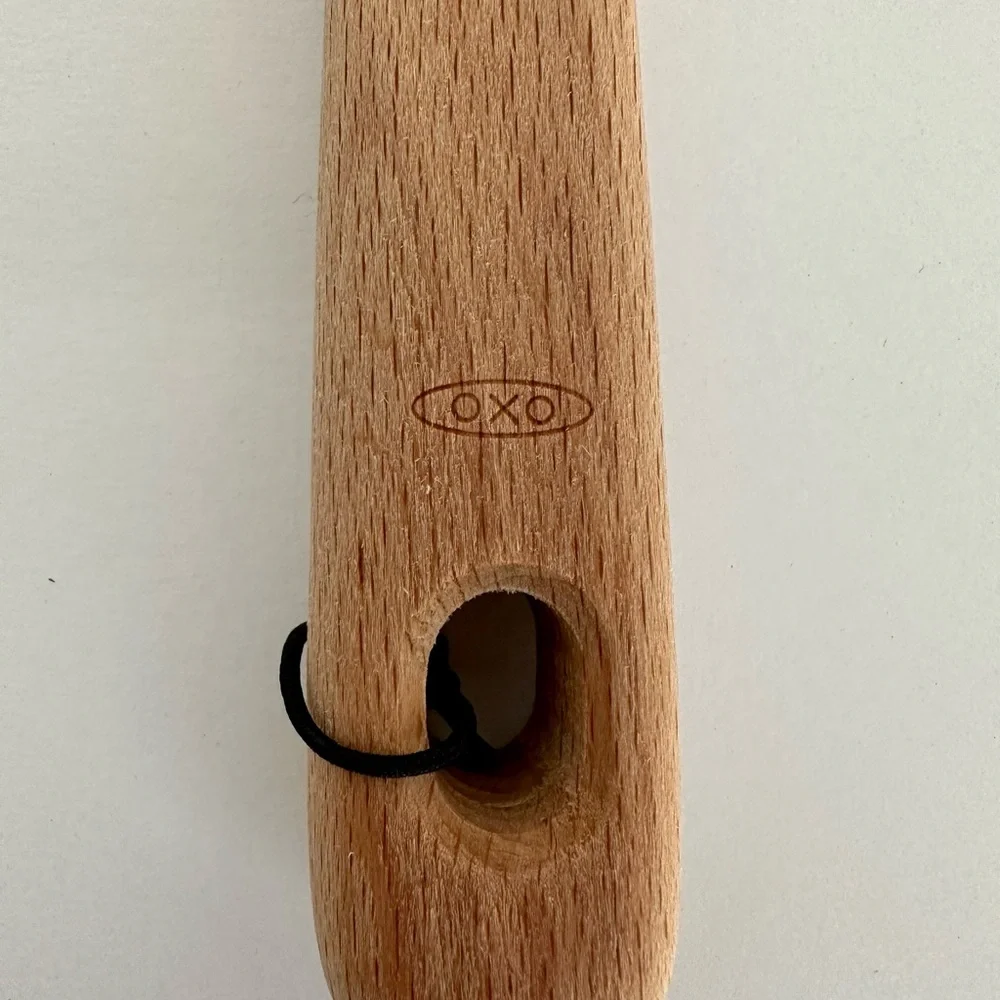 NWOT OXO Wooden sauté one peace cookware paddle hanging hole allows for storage